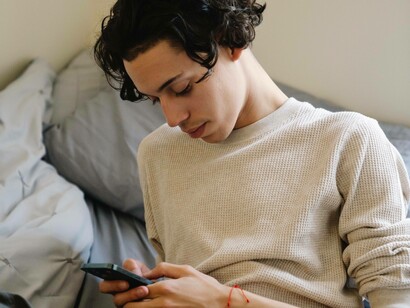Man using social media on phone
