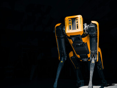 Side close-up of a Boston Dynamics Spot robot, symbolizing cutting-edge AI robotics and the next stage of intelligence evolution