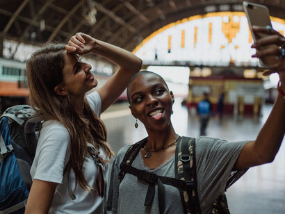 With backpacks packed light and hearts full of wanderlust, these eco-warriors epitomize the spirit of sustainable exploration at the train station