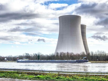 A nuclear power plant near a lake uses a lot of water in the hopes of producing safe energy