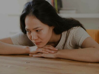 A woman in tears has removed her wedding ring after discovering her partner cheated