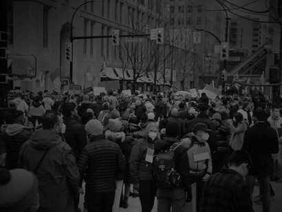 A crowd of protestors marching for peace and equality