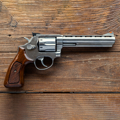 Depending on the Quantum particle measurement, the gun will either fire, or it won't