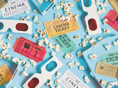 Top view of a collection of cinema tickets, representing the anticipation of moviegoing