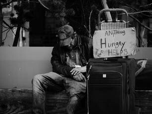 A man who is starving is calling for help