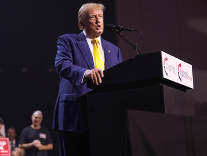 Former President of the United States Donald Trump speaking with attendees at a "Chase the Vote" rally at Dream City Church in Phoenix, Arizona, 2024