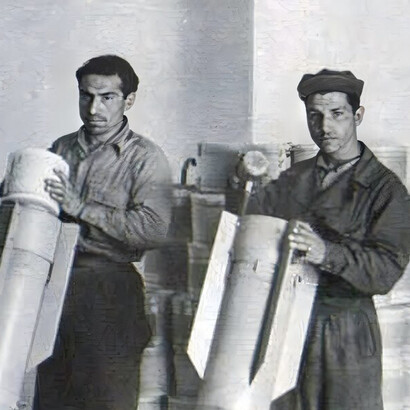 OSS officers preparing "bombs" filled with propaganda for distribution in Germany, 1945
