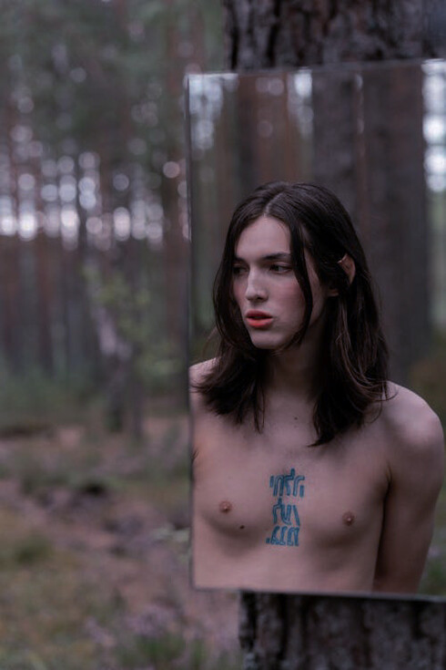 Contemplating the image that challenges our perception of self, where the yearning for transformation meets the complexities of acceptance