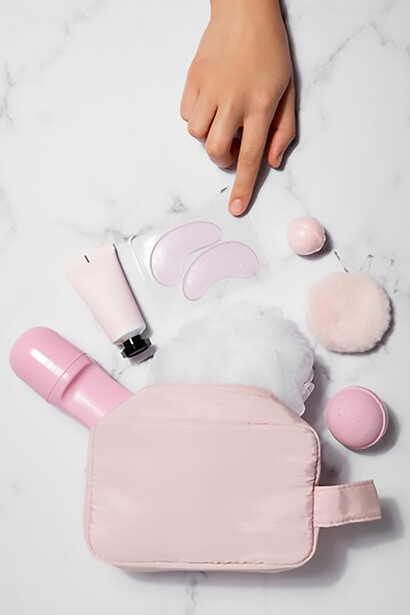 Explore a world of beauty possibilities with a chic vanity case brimming with an array of makeup, skincare, and cosmetics to elevate your daily routine