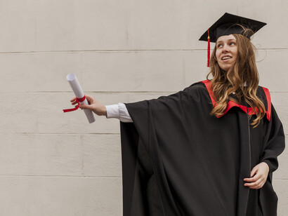 A freshly graduated girl, filled with happiness