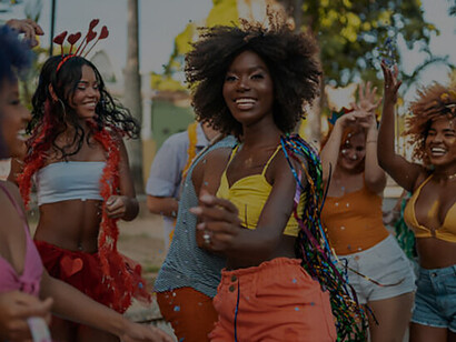 Dynamic street festivities with vibrant Black women celebrating and enjoying themselves