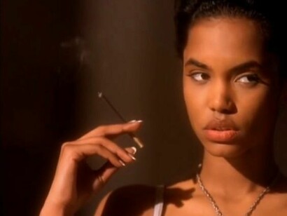 A woman smoking elegantly