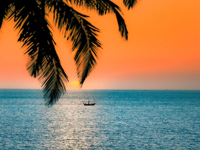 A breathtaking close-up of the sunset over Goa, India, showcasing the golden hues