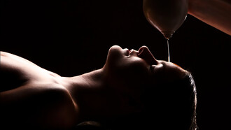 Shirodhara oil therapy, a soothing Ayurvedic treatment, performed in an Indian spa to promote deep relaxation and inner balance