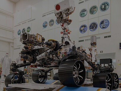 In a clean room at NASA's Jet Propulsion Laboratory in Pasadena, California, engineers observed the first driving test for NASA's Mars 2020 rover on Dec. 17, 2019