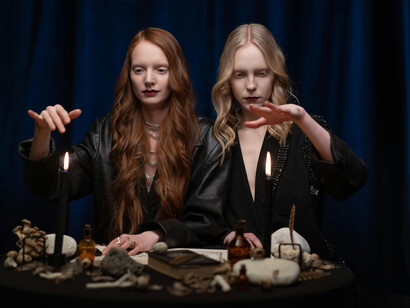 A couple of witches getting ready for a ceremony