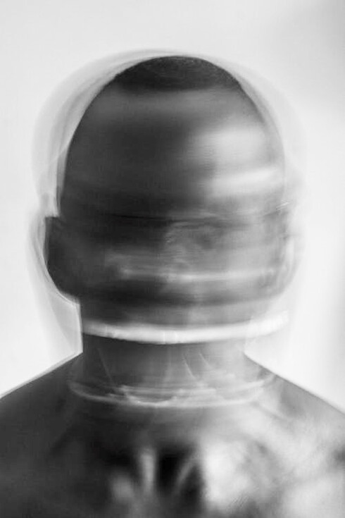 Blurred man screaming, craving to be understood by those around him