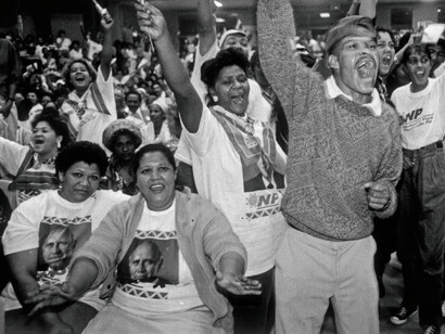 Coloured South Africans in Ennerdale, South Africa, showing their support for the National Party, a party which previously persecuted them, during the country's general elections in April, 1994