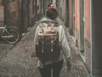 A woman traveling the world with her backpack