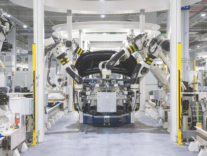 Factory floor during machine assembly, capturing the shift toward intelligent, AI-driven manufacturing environments