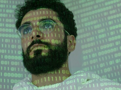 A data expert immersed in code, representing Morocco’s advanced intelligence structure