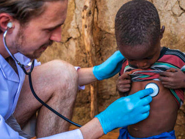 Amid dire circumstances, a Doctors Without Borders doctor provides much-needed medical care to a young child, underscoring the importance of non-state actors in global health and humanitarian efforts